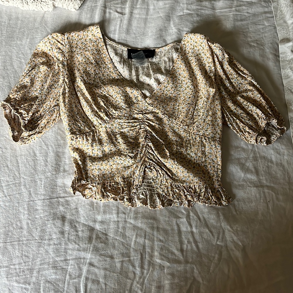 Yellow crop top with blue flowers